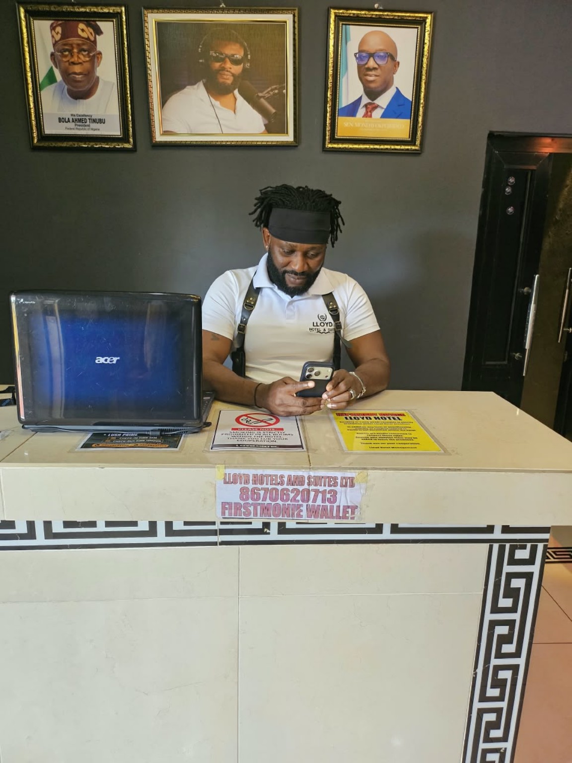 Lloyd Hotel reception desk with a team member ready to welcome guests
